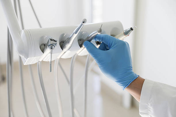 Professional Tooth Extraction technician working in White Hall, IL